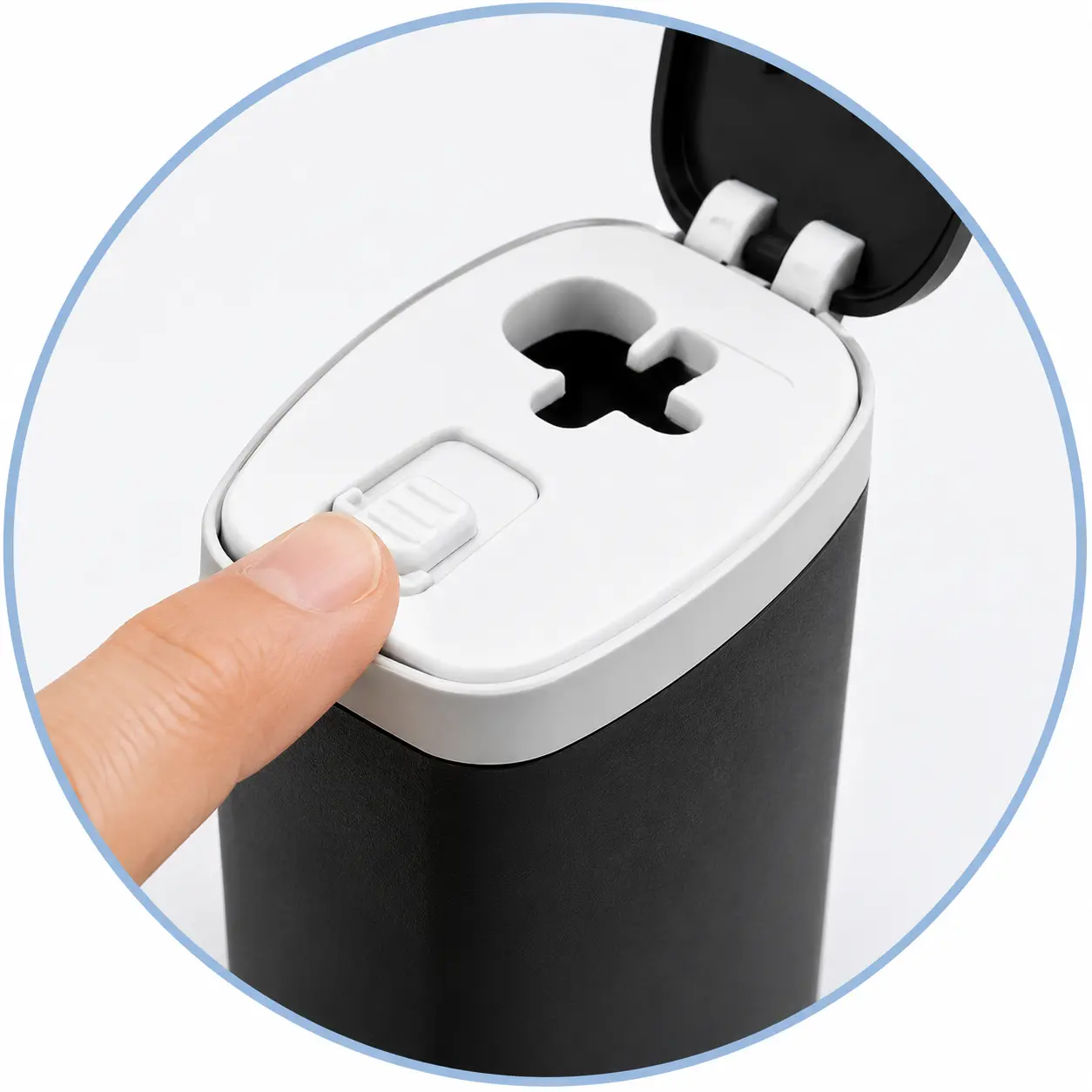 Close view of the locking switch and disposal opening on a portable sharps case