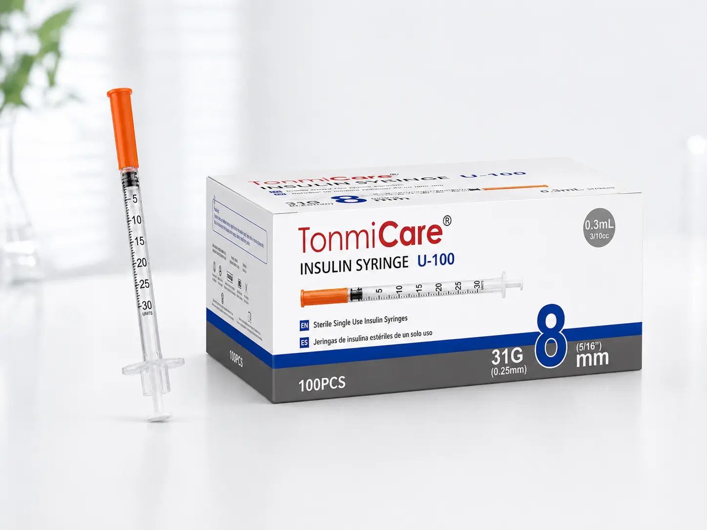 0.3 mL insulin syringes with orange needle caps and 0.3 mL product packaging